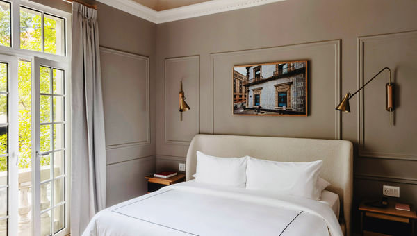 Guestrooms feature Mexican design touches like Oaxacan throw rugs and landscape photos. Guestrooms feature Mexican design touches like Oaxacan throw rugs and landscape photos.