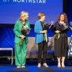 After Vacation Planners president Jenn Lee, second from right, was named godmother of AmaWaterways' AmaSintra, other AmaWaterways godmothers took the stage. From left, Cruise Planners' Michelle Fee, Jackie Friedman of Nexion and Debbie Fiorino of Dream Vacations and Cruise One. Alex Pinelo of AmaWaterways is at the right.