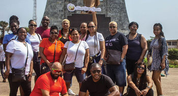 The author and her group of clients in Accra, Ghana, at the Kwame Nkrumah Memorial Park and Mausoleum in 2019.