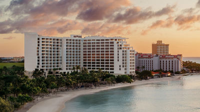 Amenities at The St. Regis Aruba Resort include six dining venues, two infinity pools with private cabanas, a fitness center, a casino and a spa.