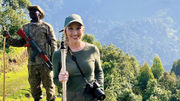 Solo traveler Codi Land navigates Bwindi's rugged terrain on a guided gorilla trek with Nkuringo Safaris.
