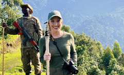 Solo traveler Codi Land navigates Bwindi's rugged terrain on a guided gorilla trek with Nkuringo Safaris.